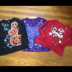 Three long sleeve shirts